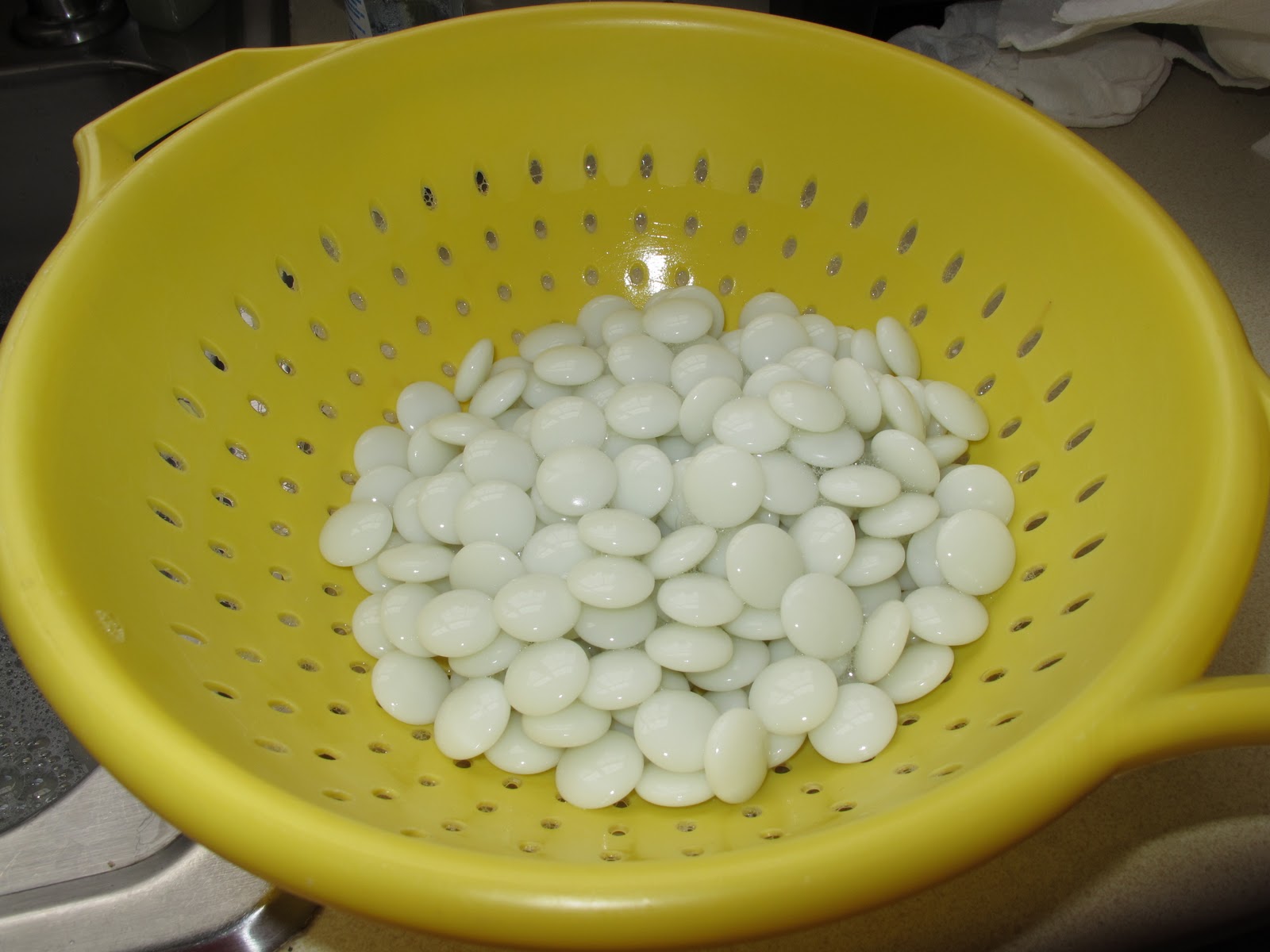 White stones after the wash.  The water makes them look glossy.