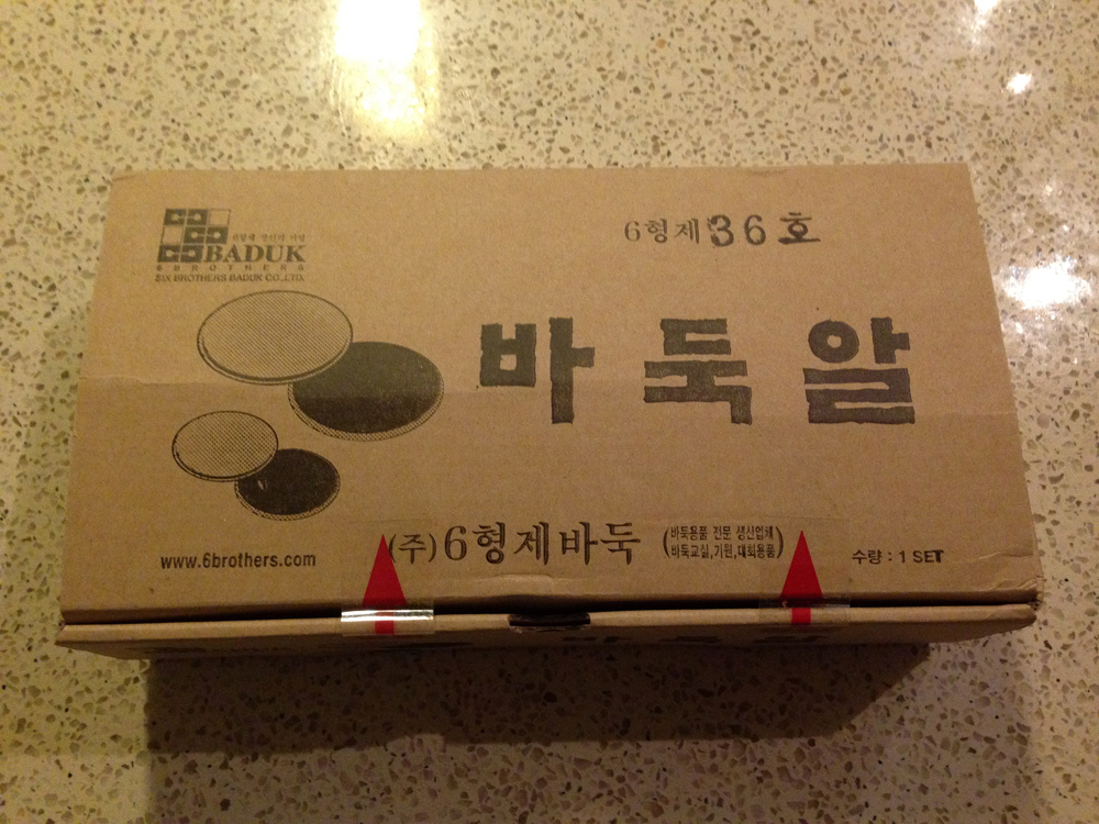 The go stones nicely packaged in a Baduk Brother box.