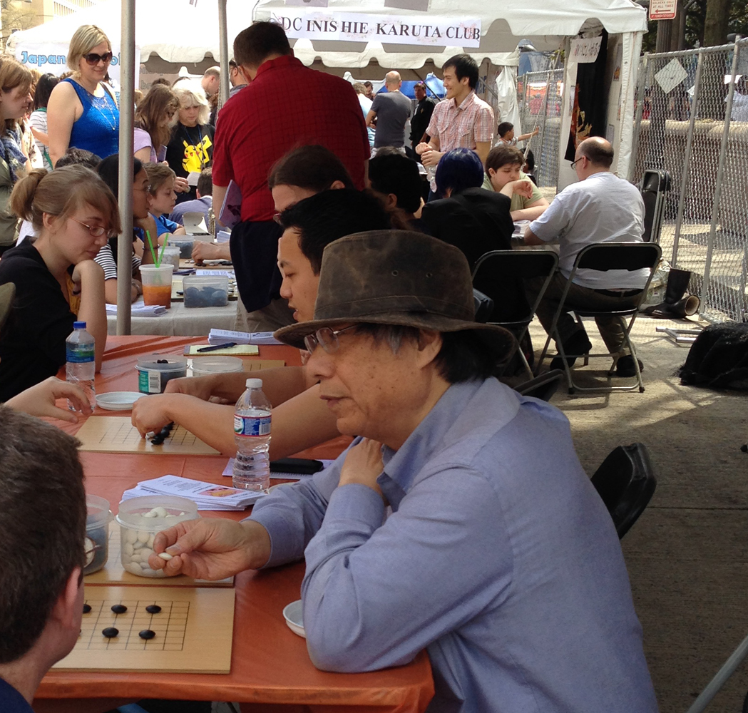 Another shot of us busy at work teaching the never ending crowd of people looking to sit down and have a shot to learn themselves!