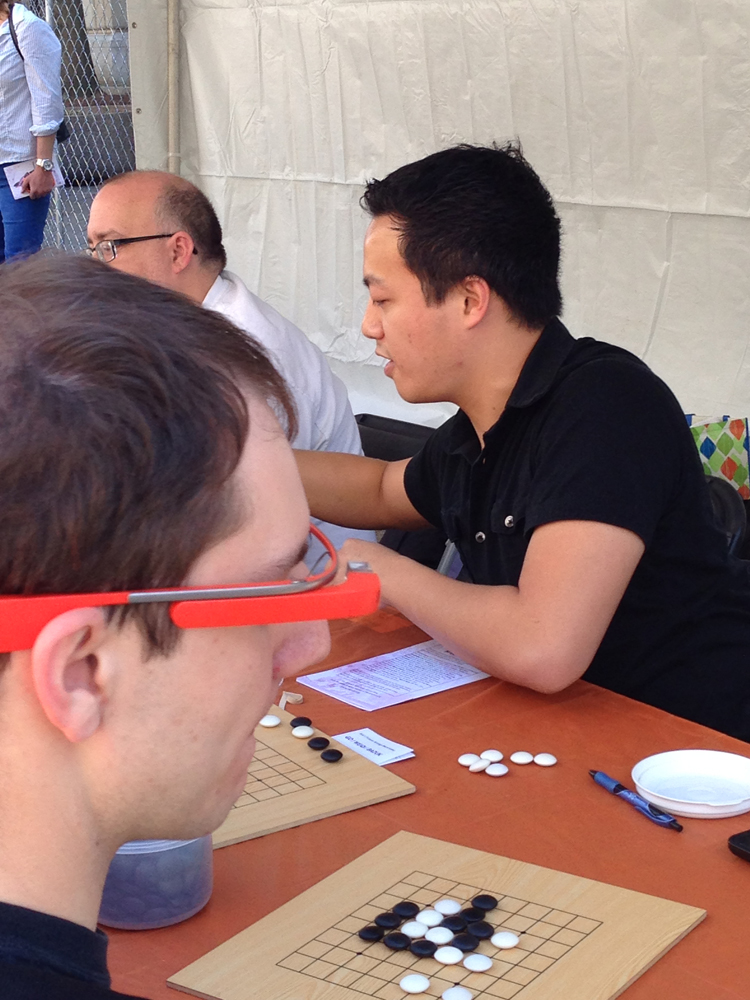 Here's a shot of me trying to switch between four different simultaneous teaching games. For  the tech nerds, one of my customers had Google Glasses on! How awesome is that?!