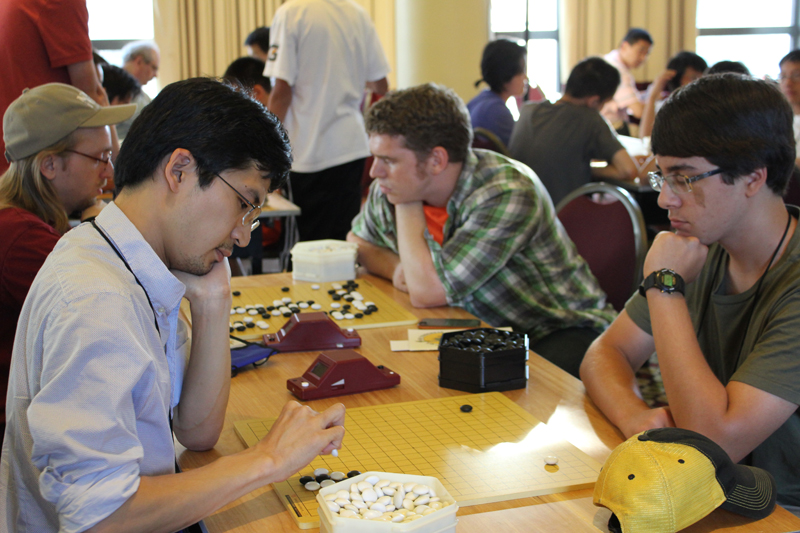 Satoru and Michael playing a game.